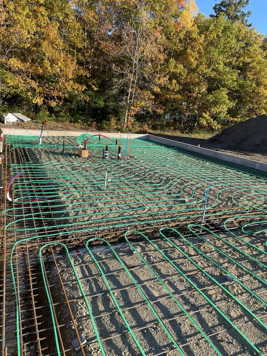 New build radiant tubing laid out across reinforced slab area